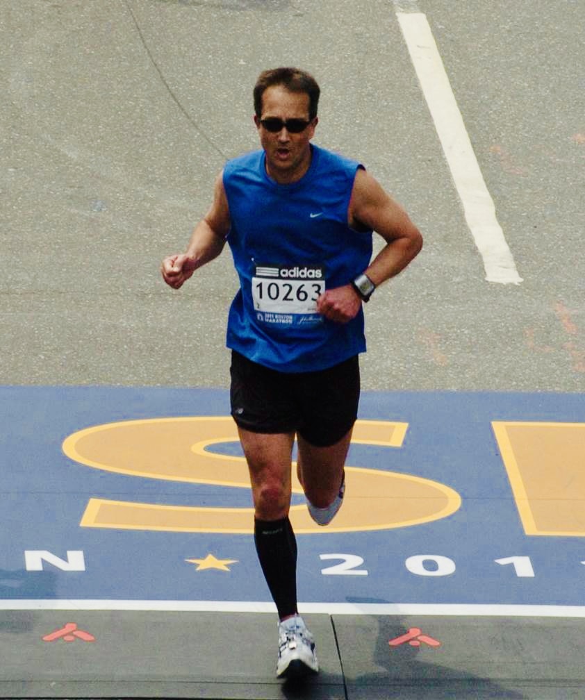 Brad finishing the Boston Marathon in 2011.